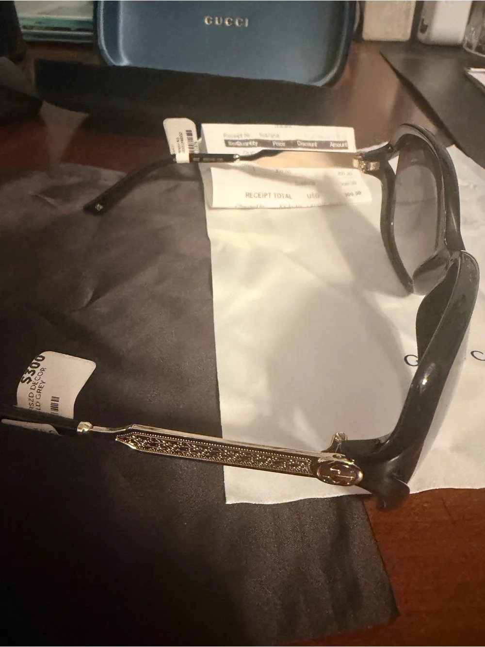 Gucci Women's Black Frame Sunglasses with Dark Gradient Lenses